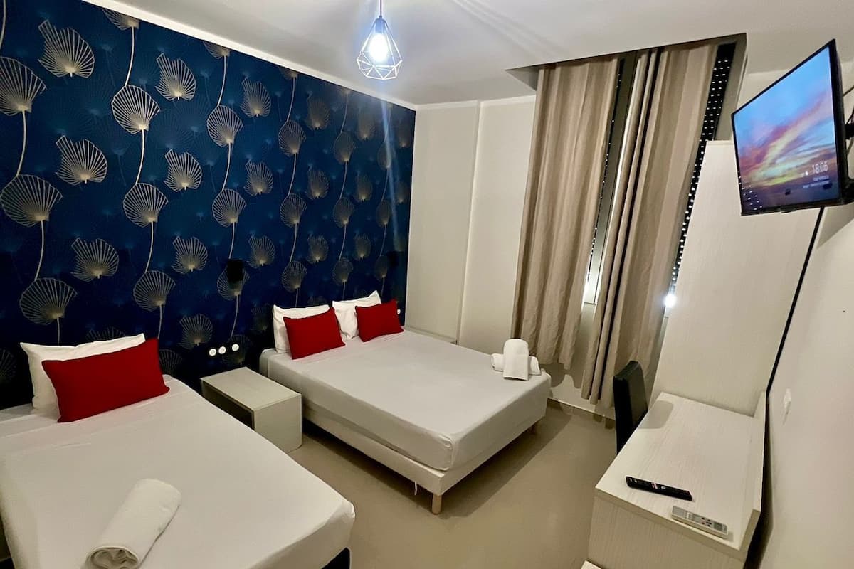 Triple Room, City View | Desk, free WiFi