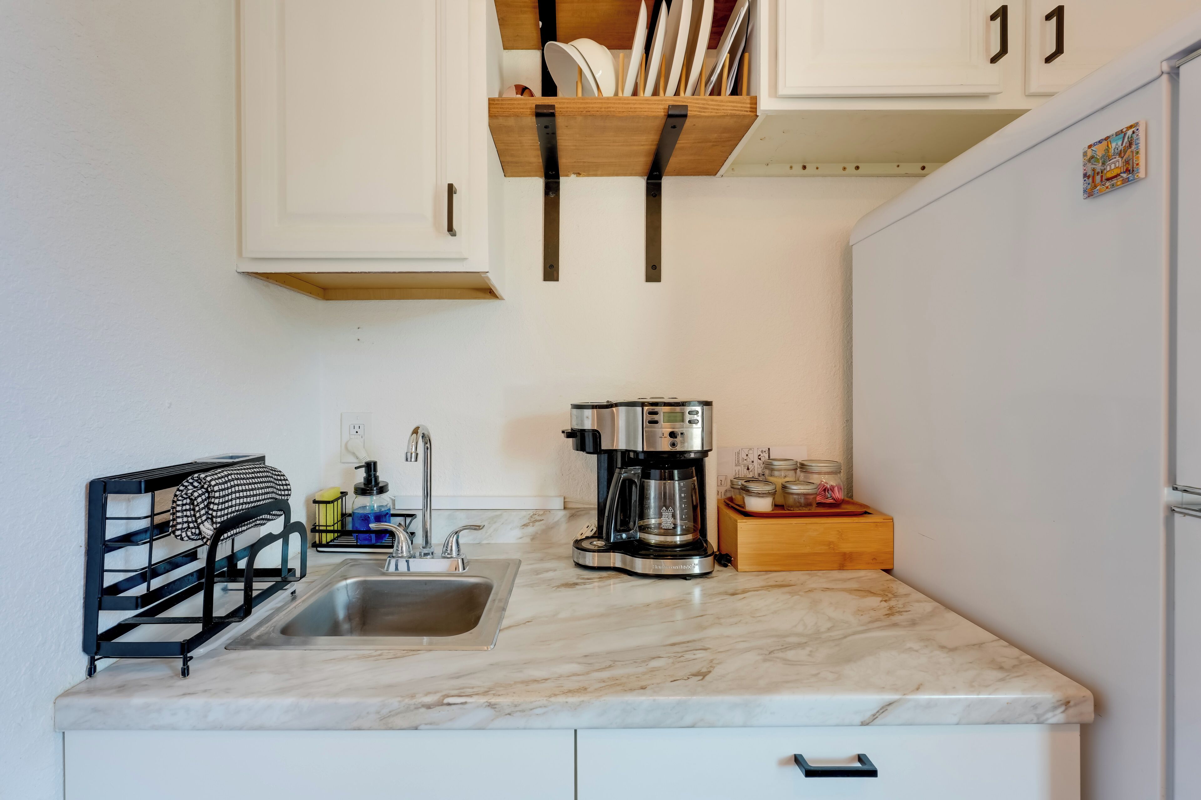 Fridge, microwave, coffee/tea maker, toaster