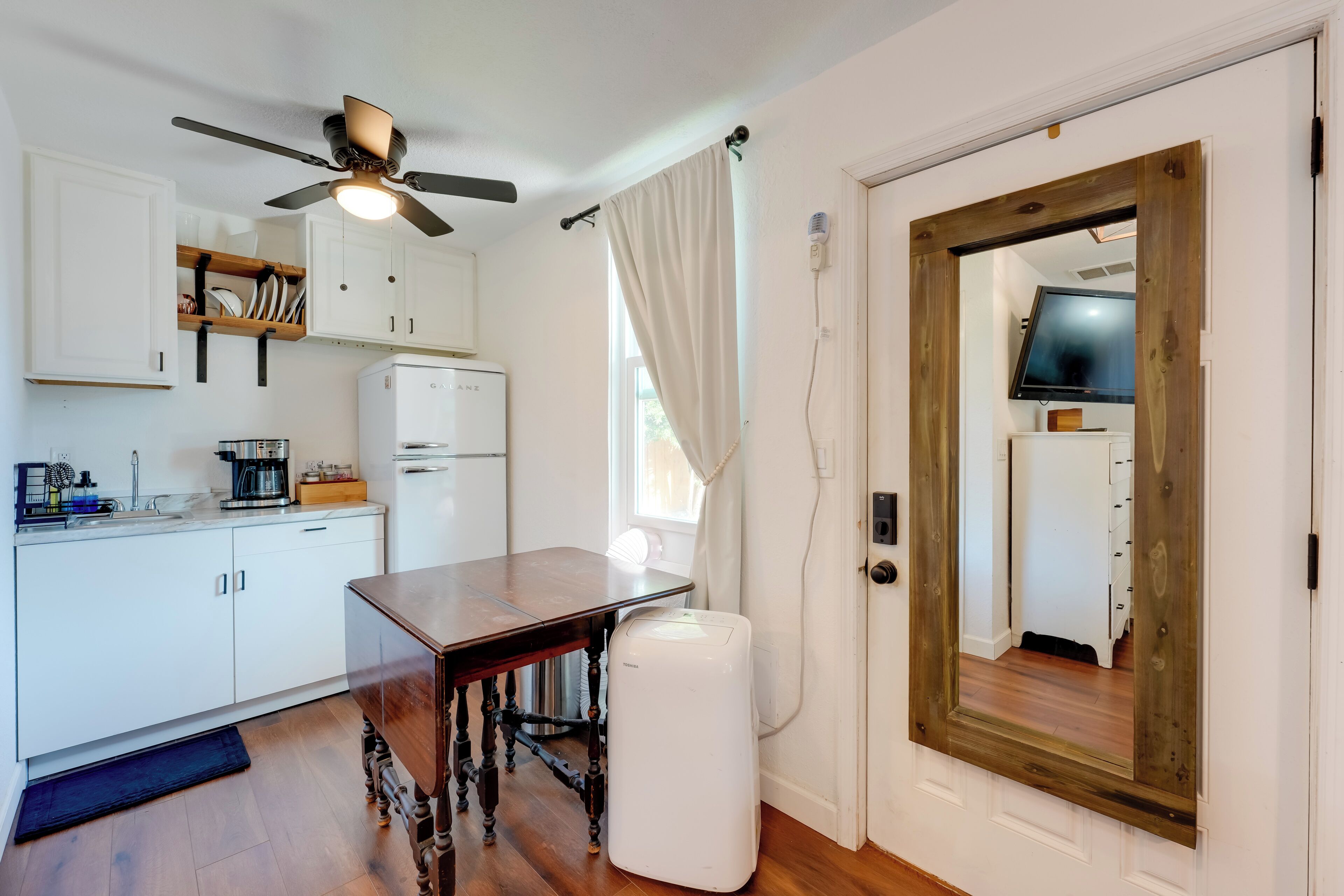 Fridge, microwave, coffee/tea maker, toaster