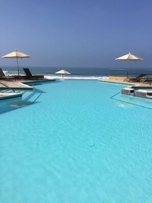 Outdoor pool, a heated pool - Amazing luxury Ocean Front Condo Rosarito Beach (Rosarito)