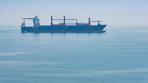 A large cargo ship on calm waters. - Seafront penthouse with WiFi, parking, and air conditioning in Malaga (Málaga)