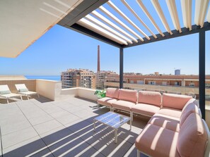 Terrace/patio - Chic 3-bedroom apartment with terrace, Wifi, and parking in Malaga (Málaga)
