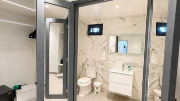 Shower, hair dryer, towels, soap