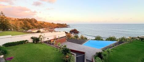 Outdoor pool, pool umbrellas, pool loungers