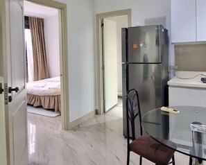 Appartement Deluxe, vue jardin, côté jardin | Coin séjour