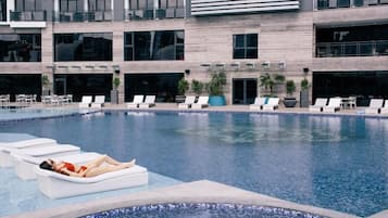 3 outdoor pools, open 6:00 AM to 10:00 PM, pool cabanas (surcharge)