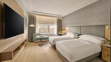 Deluxe kamer, 2 eenpersoonsbedden | Hypoallergeen beddengoed, een kluis op de kamer