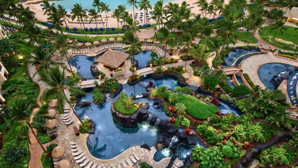 A resort with multiple swimming pools, palm trees, and a beach area. - Luxury 3BR Villa with Ocean Views – Marriott's Ko' Olina Beach Club (Kapolei)