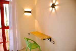 Chambre Triple Deluxe, balcon, vue montagne | Intérieur