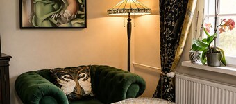 A stylish retreat in the Art Deco/Art Nouveau style with an English cottage vibe