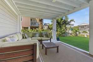 Terrace/patio - Hooked on Avocado -Stunning 5 Bedroom/ 3 Bath waterfront home on canal, resort style private pool & hot tub, 34’ dock, and quick open-water Gulf and Atlantic access. Ice Maker, Ping Pong table. Minutes to Sombrero Beach & Dining. (Marathon)