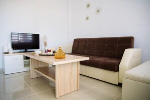 TV - Sunset Sea View Cottage Apartment with Sea View, Wi-Fi, and Air Conditioning (Νέα Ποτίδα ια)