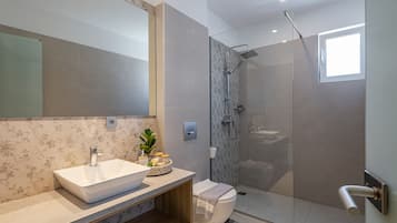 Apartment, Balcony, Beach View | Bathroom | Slippers, soap, shampoo, toilet paper