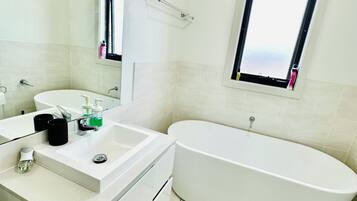Shower, towels, soap, shampoo