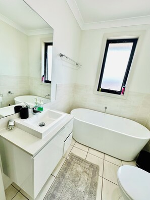 Shower, towels, soap, shampoo