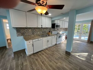 Private kitchen - Beautiful , serene and spacious  downstairs 2-bedroom house in pine island (Saint James City)