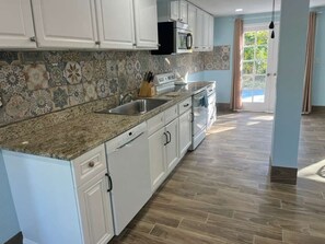 Private kitchen - Beautiful , serene and spacious  downstairs 2-bedroom house in pine island (Saint James City)
