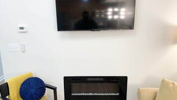 TV and an electric fireplace to snuggle and watch movies.