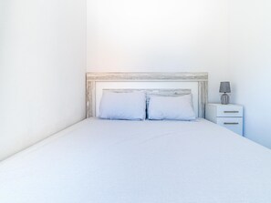 2 habitaciones, tabla de planchar con plancha y internet 