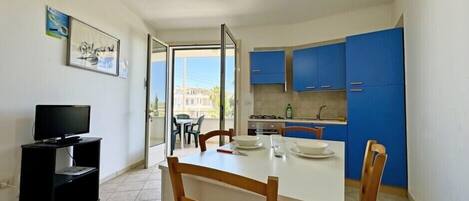 Fridge, oven, coffee/tea maker, cookware/dishes/utensils