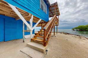Exterior - Rustic Oceanfront Cabin on Private Island with beach access & kitchen (Placencia)