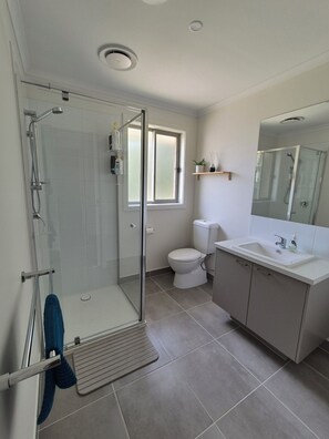 Shower, towels, toilet paper