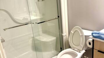 Hair dryer, towels, soap, toilet paper