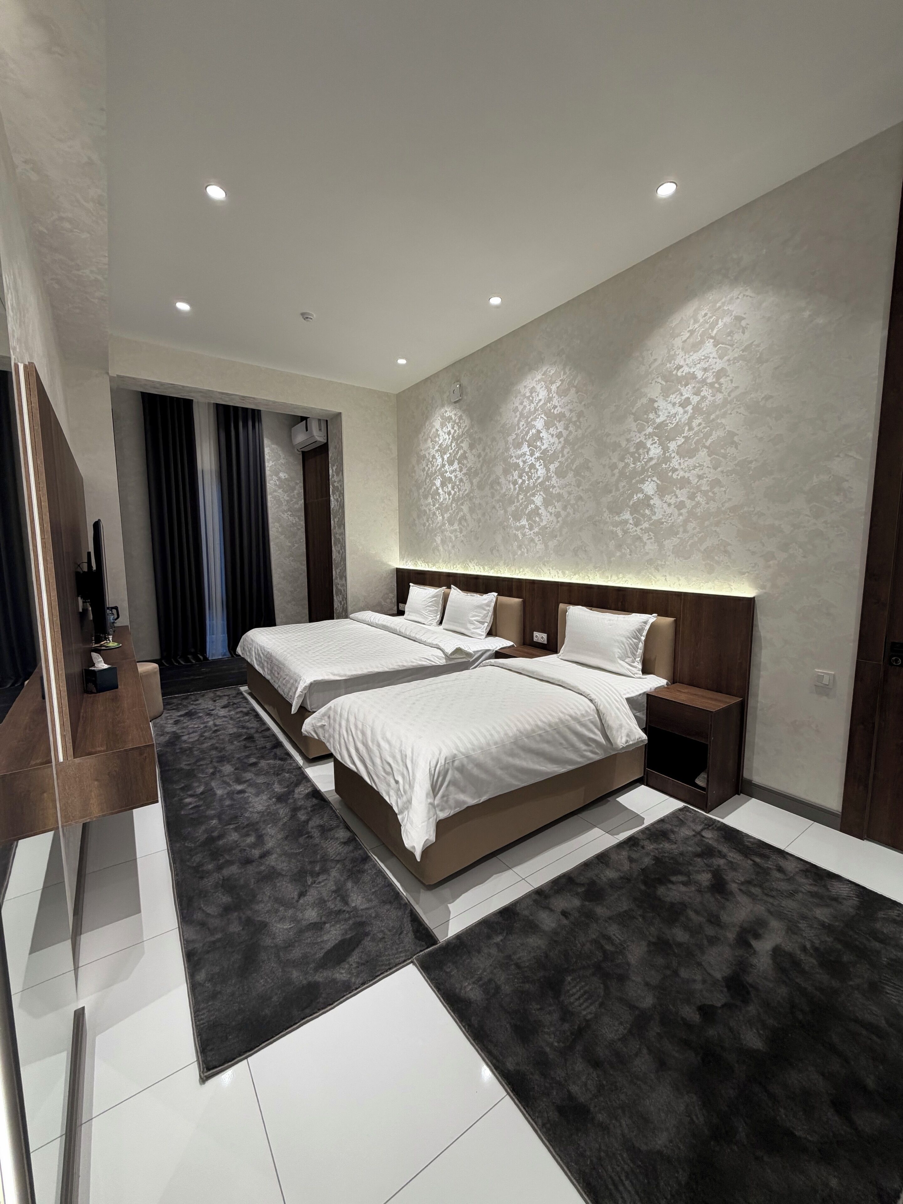 Habitació triple familiar, frigorífic, vistes a la ciutat | Wifi gratuïta 