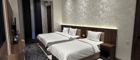 Family Triple Room, Refrigerator, City View | Free WiFi