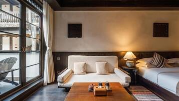 Chambre Double Deluxe, vue ville | Coin séjour