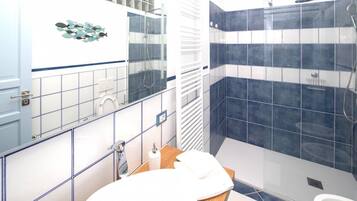 Shower, bidet, towels, toilet paper