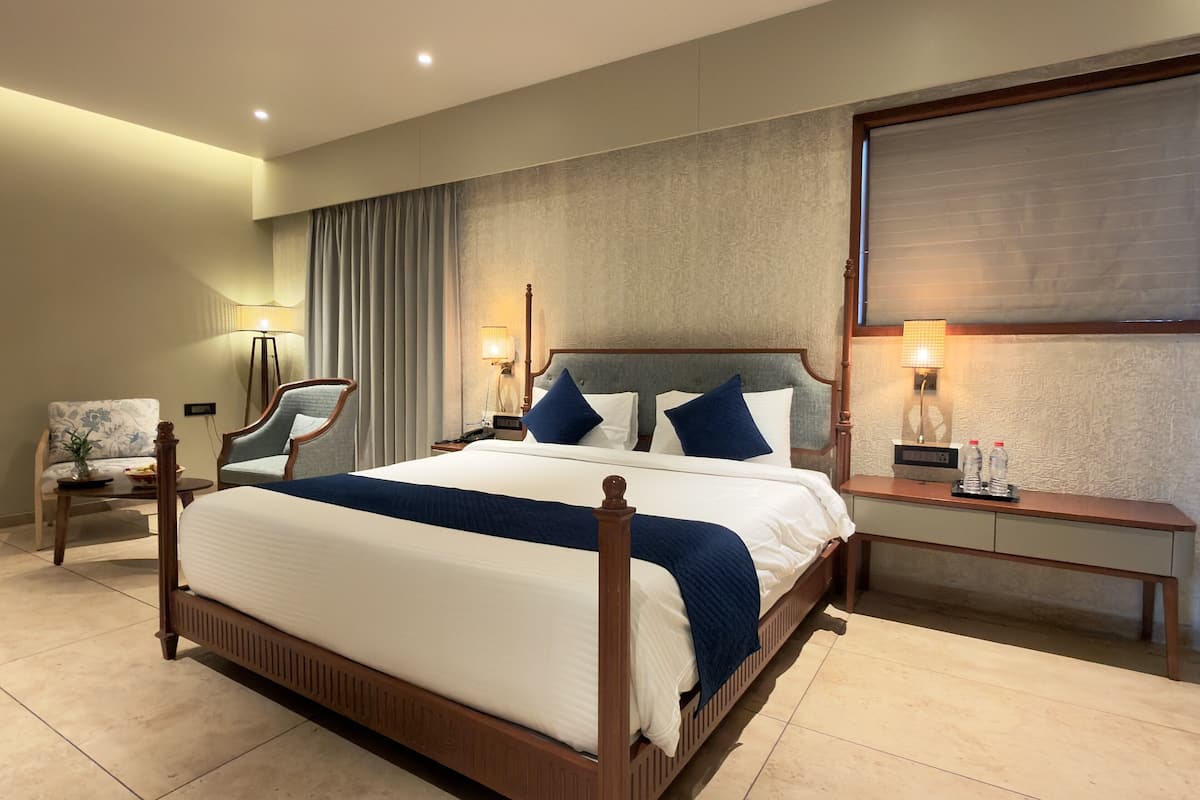 Luksushuvila | Ylelliset vuodevaatteet, minibaari, tallelokero huoneessa