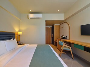 Ropa de cama de alta calidad, minibar, caja fuerte y cortinas opacas