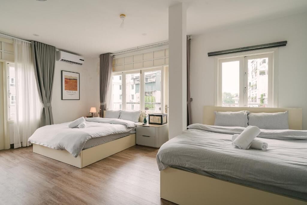 Family Room, Balcony, City View | Desk, laptop workspace, soundproofing, iron/ironing board