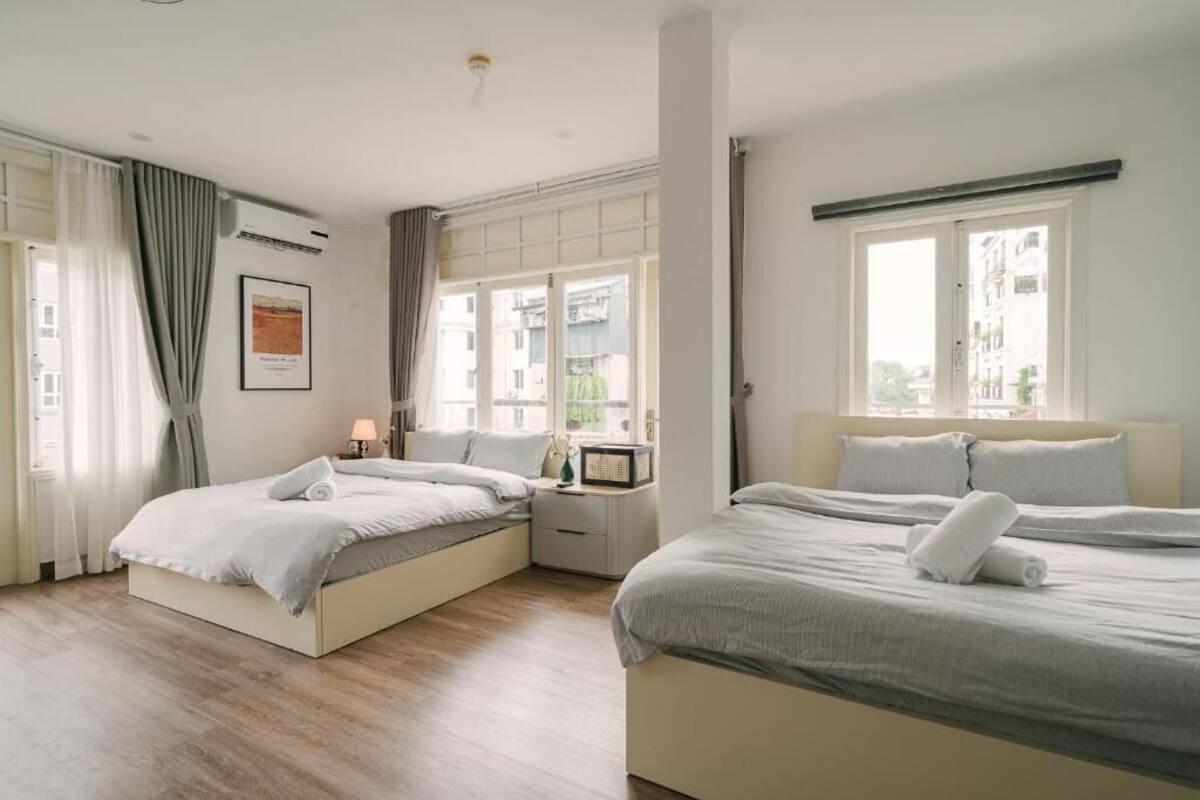 Family Room, Balcony, City View | Desk, laptop workspace, soundproofing, iron/ironing board