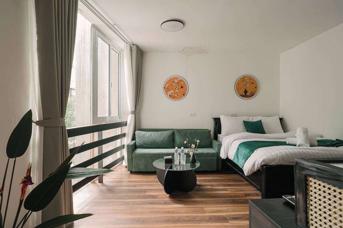 Deluxe Double Room, City View | Desk, laptop workspace, soundproofing, iron/ironing board