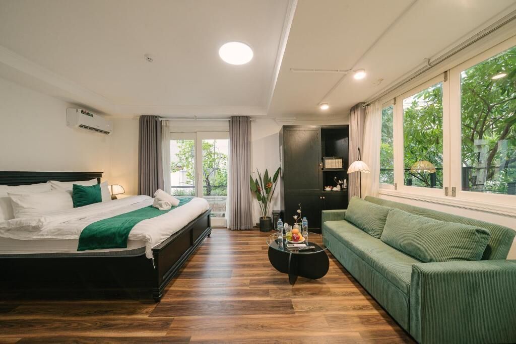 Junior Suite, Balcony, City View | Desk, laptop workspace, soundproofing, iron/ironing board