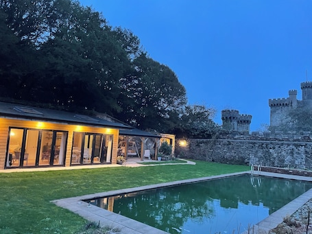 Pool. Private garden house with cold water natural swimming pool in Castle estate.