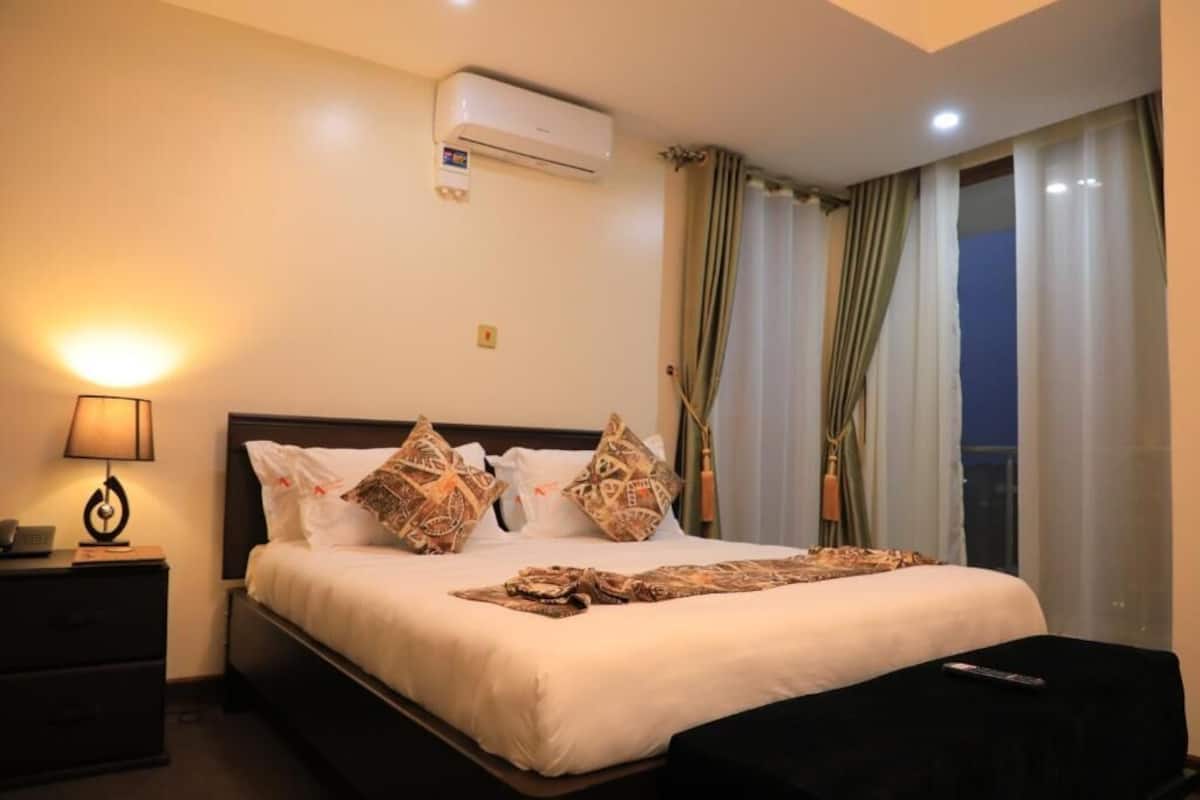 Standard Double Room, Balcony, Courtyard View | In-room safe, blackout drapes, soundproofing, iron/ironing board