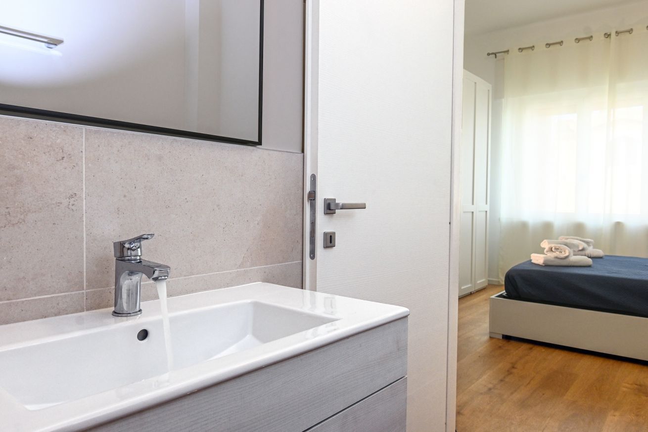 Doccia, bidet, asciugamani, shampoo