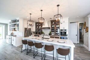 Fridge, microwave, oven, stovetop - Luxury Home Steps to the Beach with Pool, Spa and Rooftop! (Holmes Beach)