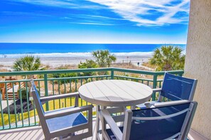 Outdoor dining - Windy Hill Dunes 205- 3BR/3BA oceanfront condo in Windy Hill (North Myrtle Beach)
