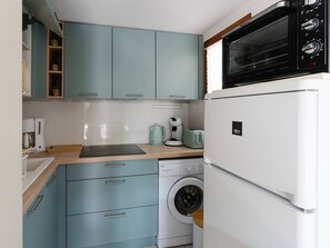 Microwave, stovetop, coffee/tea maker, toaster