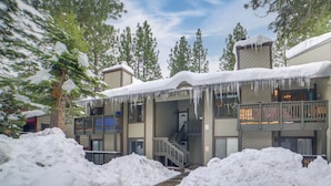 A multi-story building with snow-covered roofs and a central staircase. - 1 Mi to Village & Eagle Lodge! Extended Stay Unit (Mammoth Lakes)