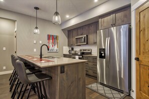 Fridge, microwave, oven, stovetop - Bottom Floor, Walk Out Condo with great ski access and private hot tub! (Sun Peaks)