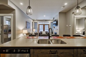 Interior - Bottom Floor, Walk Out Condo with great ski access and private hot tub! (Sun Peaks)