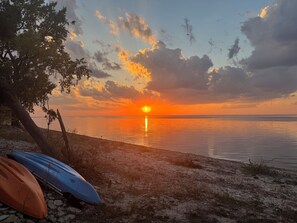 On the beach, sun-loungers, beach towels - Door County Sunsets, cozy cottage with private beach!  (Brussels)