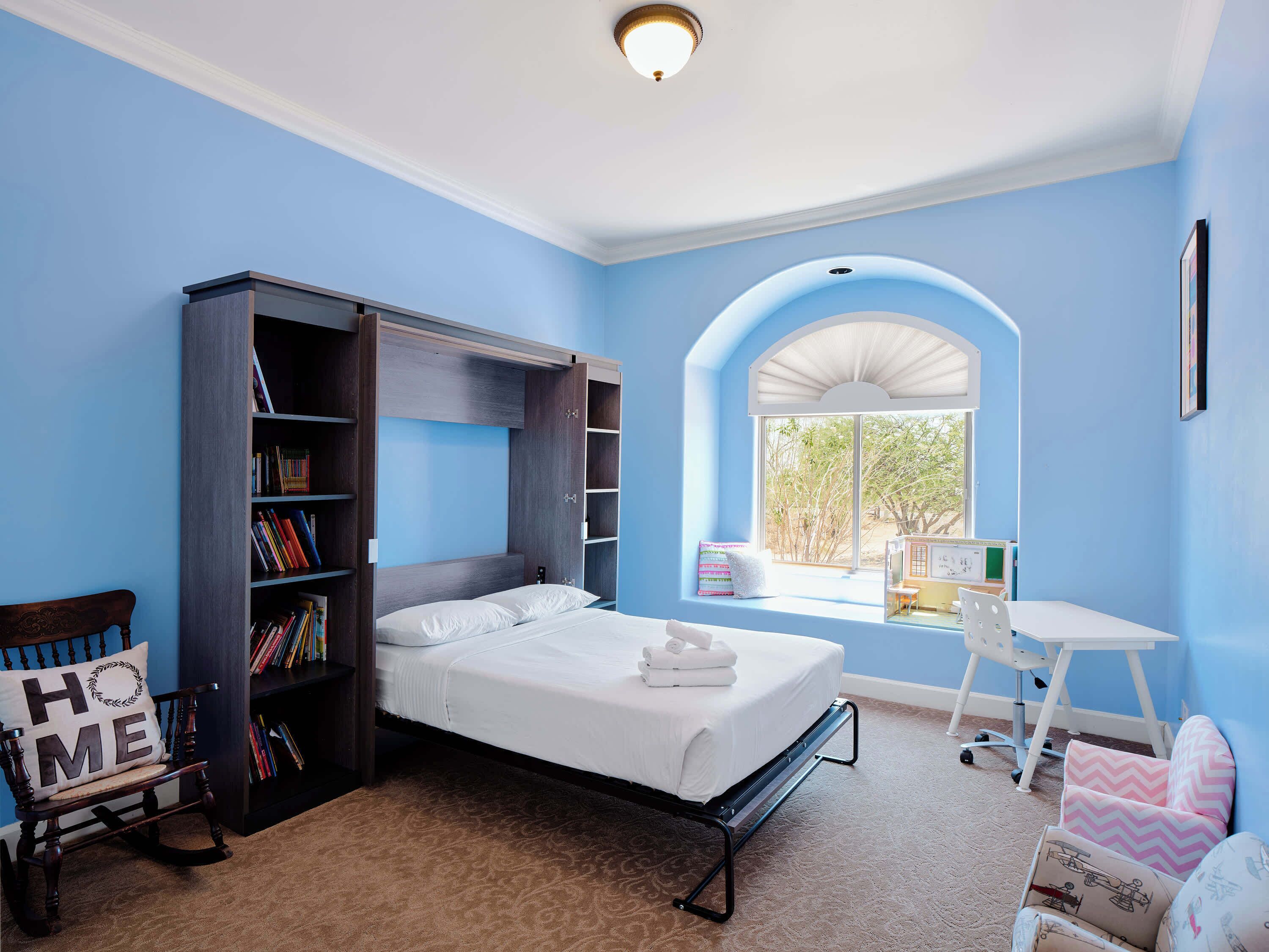 4 bedrooms, desk, iron/ironing board, travel cot