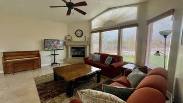 Smart TV, fireplace, table tennis, books