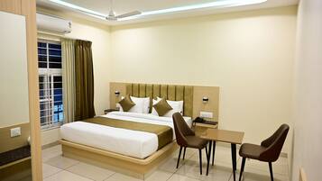 Executive Double Room, City View | In-room safe, desk, laptop workspace, iron/ironing board